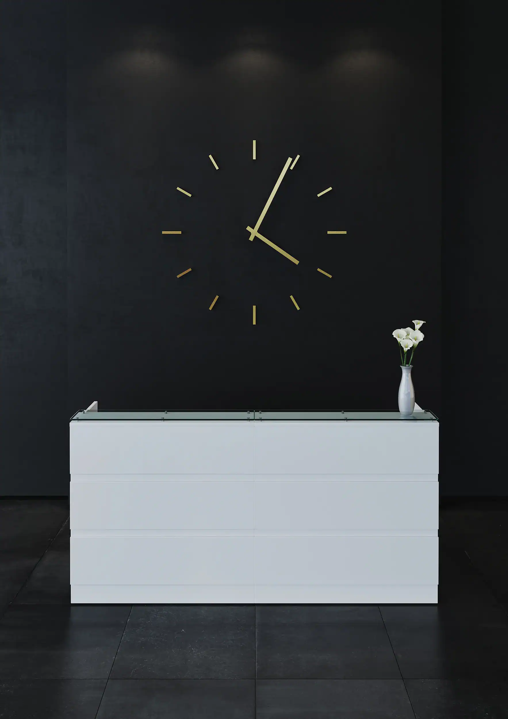 Modern reception desk in front of a dark will with a large clock
