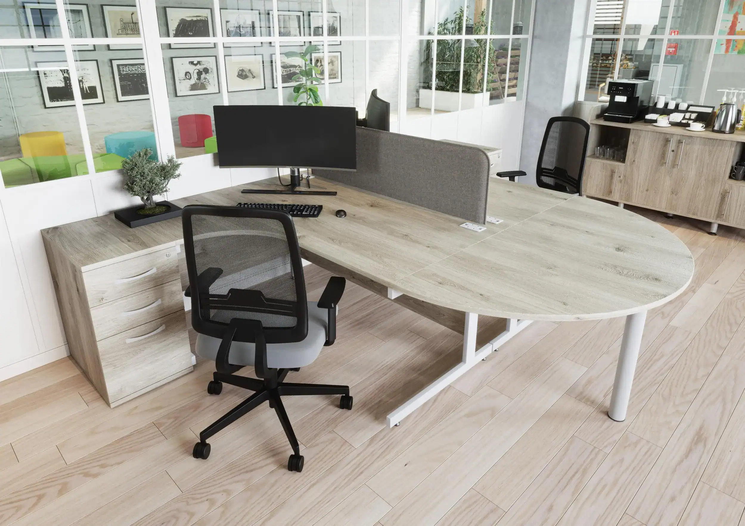 double sided curved desk, with round end, black mesh chair with black base and grey fabric seat pad