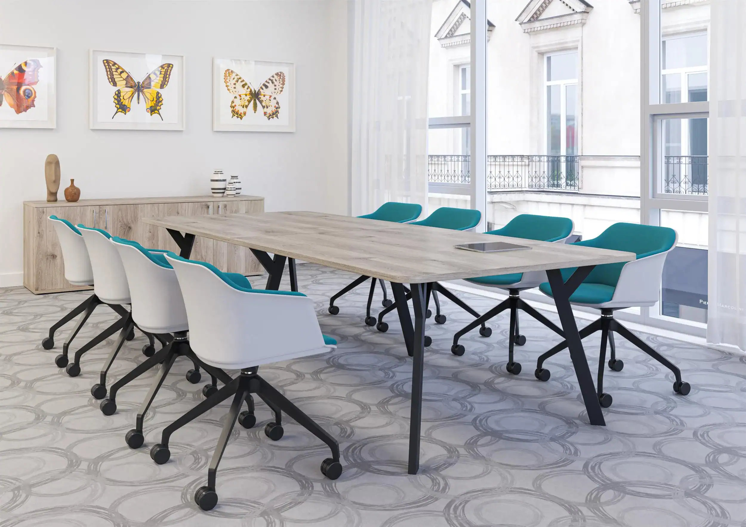 meeting table, black legs, white chairs, green fabric seat pad with black base