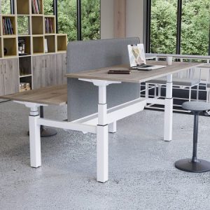 height adjustable desk, light wood top, on white legs