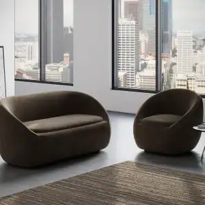 rounded brown sofa and arm chair