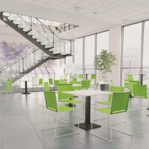 white tables with black stand and green chairs